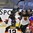 PLYMOUTH, MICHIGAN - APRIL 4: Germany's Marie Delarbre #22 celebrates after scoring to make it 2-1 against Russia with her teammates Sophie Kratzer #3, Rebecca Graeve #9, and Marie Delarbre #22 While Russia's Angelina Goncharenk #2 looks on during quarterfinal round action at the 2017 IIHF Ice Hockey Women's World Championship. (Photo by Minas Panagiotakis/HHOF-IIHF Images)